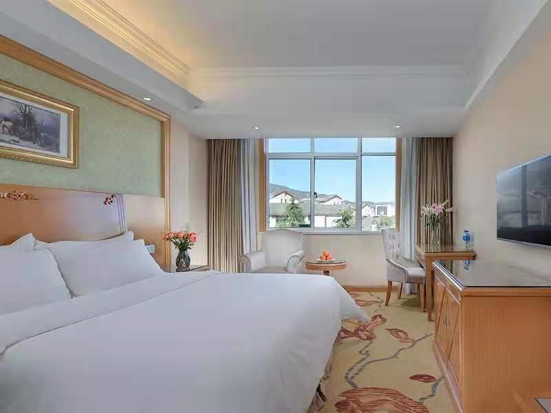 Vienna International Hotel Lijiang Yuxue Avenue Exteriör bild